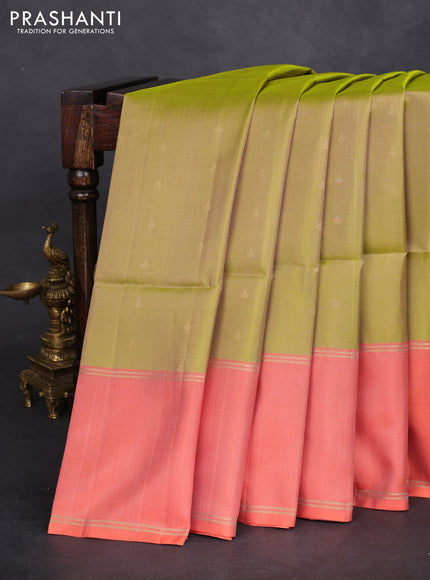 Pure soft silk saree dual shade of green and peach orange with allover zari woven buttas and rettapet zari woven border
