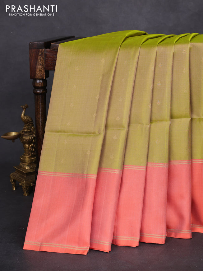 Pure soft silk saree dual shade of green and peach orange with allover zari woven buttas and rettapet zari woven border