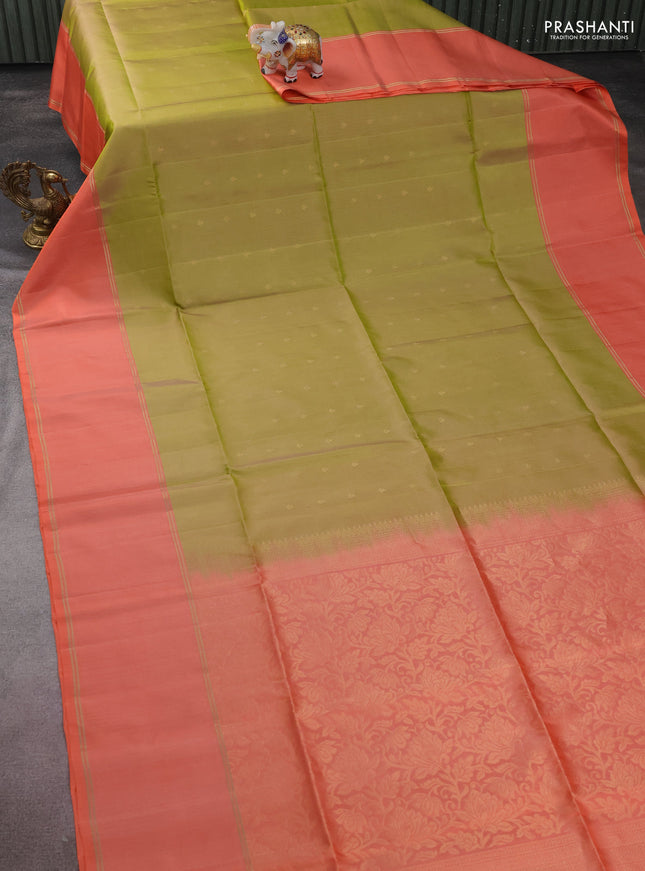 Pure soft silk saree dual shade of green and peach orange with allover zari woven buttas and rettapet zari woven border