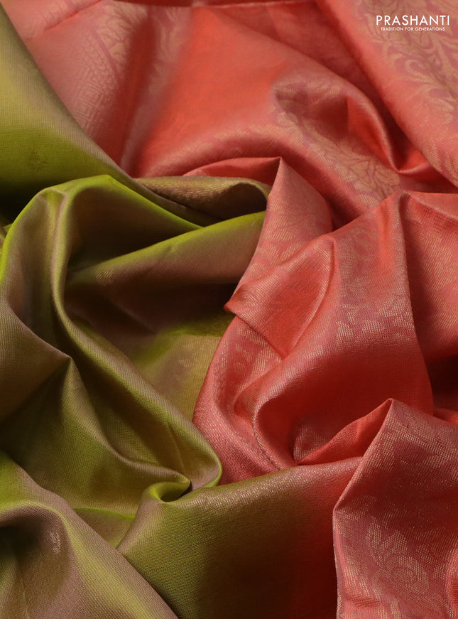 Pure soft silk saree dual shade of green and peach orange with allover zari woven buttas and rettapet zari woven border