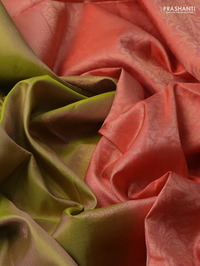 Pure soft silk saree dual shade of green and peach orange with allover zari woven buttas and rettapet zari woven border