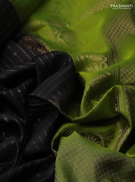 Pure soft silk saree black and light green with allover zari weaves and rettapet zari woven border