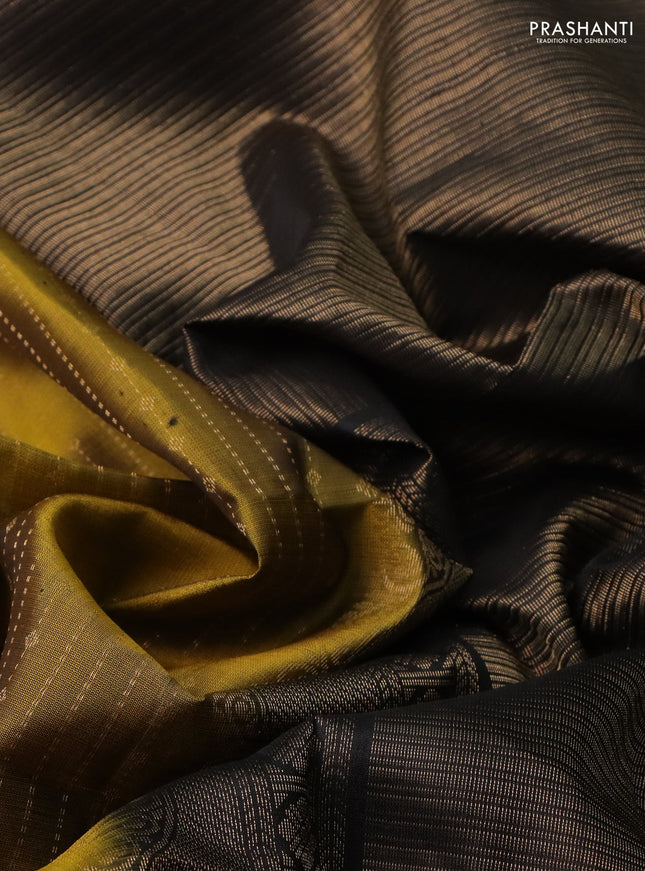 Pure soft silk saree mehendi green and black with allover zari weaves and rettapet zari woven border