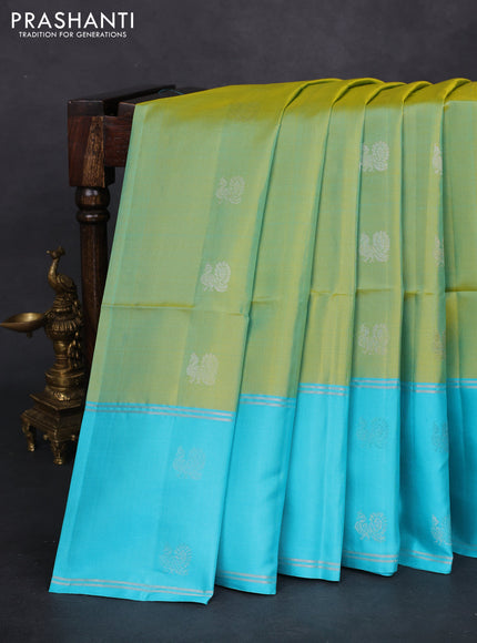 Pure soft silk saree dual shade of light green and light blue with silver zari woven buttas and long silver zari woven butta border