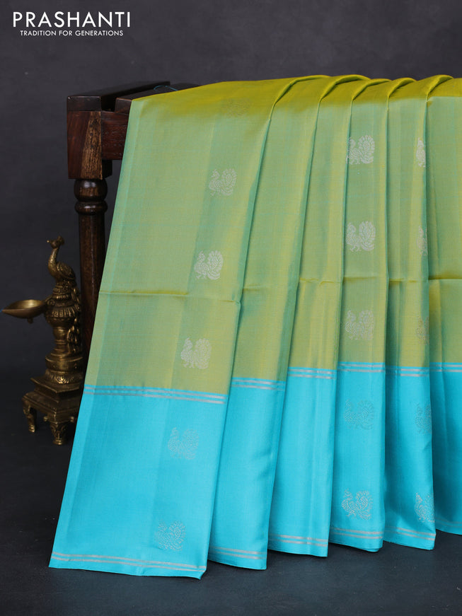 Pure soft silk saree dual shade of light green and light blue with silver zari woven buttas and long silver zari woven butta border