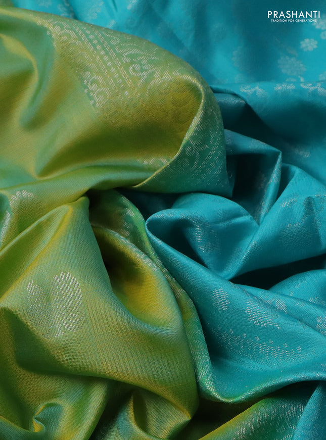 Pure soft silk saree dual shade of light green and light blue with silver zari woven buttas and long silver zari woven butta border