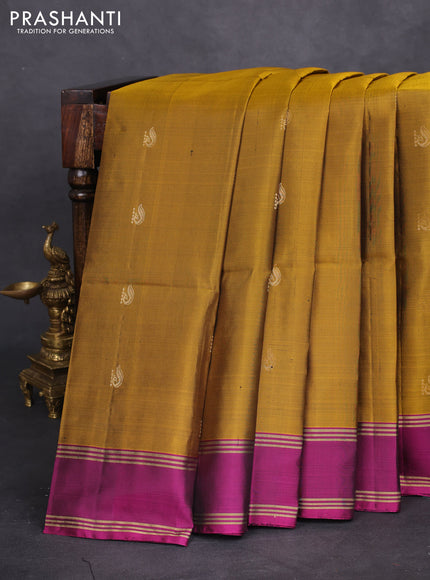 Pure soft silk saree dark mustard and purple with zari woven buttas and rettapet zari woven border