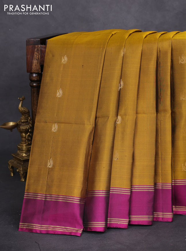 Pure soft silk saree dark mustard and purple with zari woven buttas and rettapet zari woven border