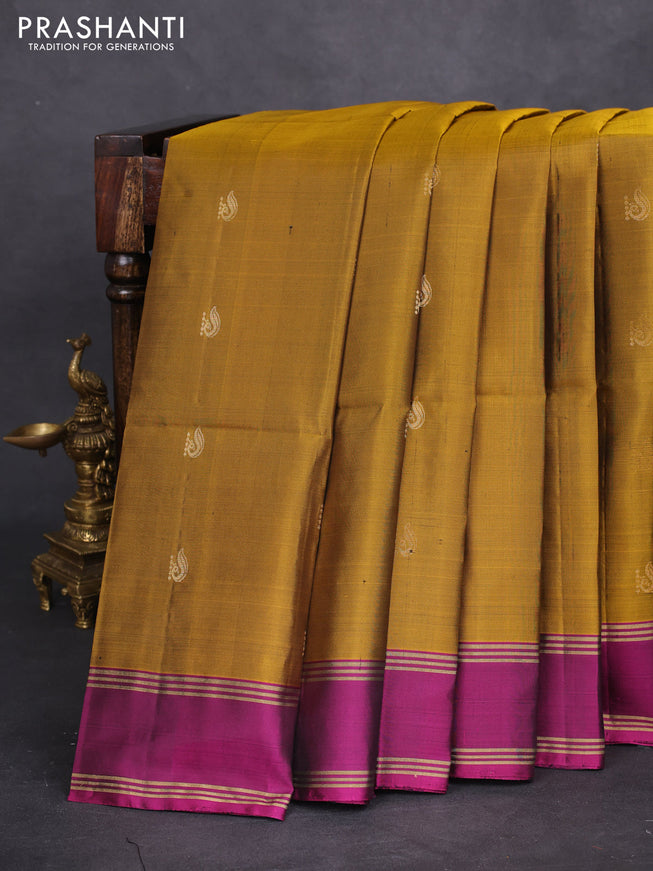 Pure soft silk saree dark mustard and purple with zari woven buttas and rettapet zari woven border