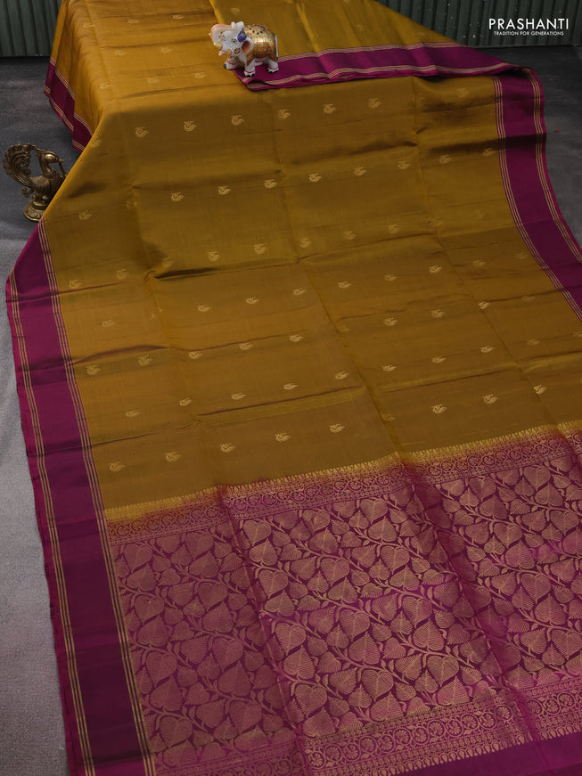 Pure soft silk saree dark mustard and purple with zari woven buttas and rettapet zari woven border