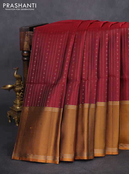 Pure soft silk saree maroon and dark mustard with allover zari weaves and rettapet zari woven border