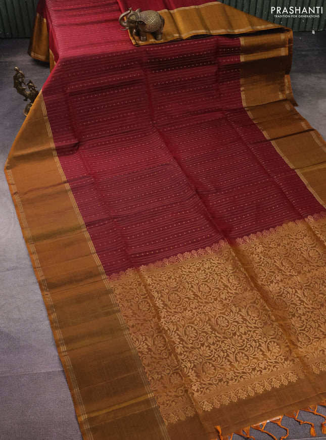 Pure soft silk saree maroon and dark mustard with allover zari weaves and rettapet zari woven border