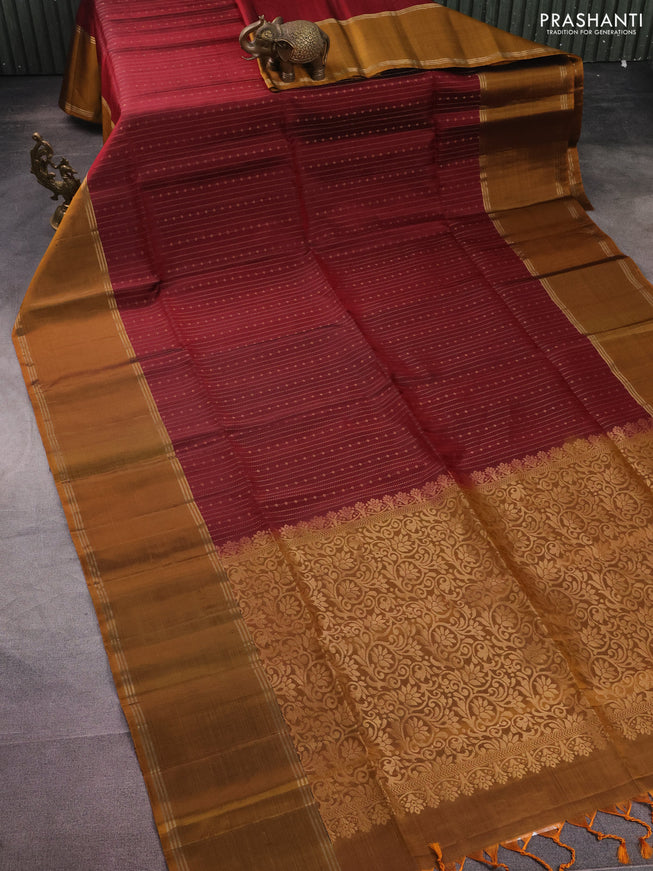 Pure soft silk saree maroon and dark mustard with allover zari weaves and rettapet zari woven border