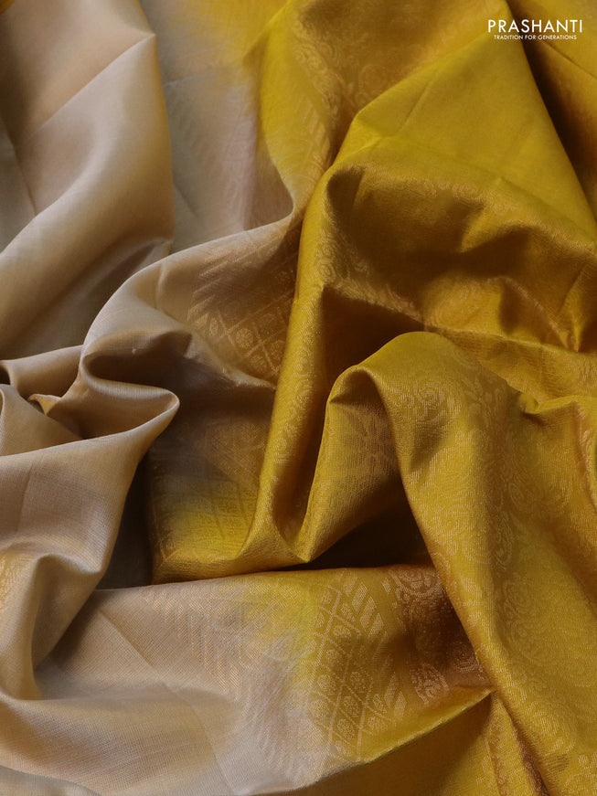 Pure soft silk saree beige and yellow with zari woven floral buttas and rettapet zari woven border