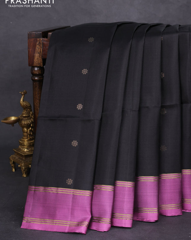 Pure soft silk saree black and purple shade with zari woven floral buttas and rettapet zari woven border