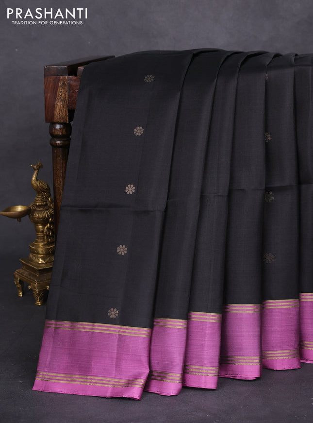 Pure soft silk saree black and purple shade with zari woven floral buttas and rettapet zari woven border
