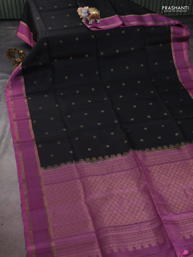 Pure soft silk saree black and purple shade with zari woven floral buttas and rettapet zari woven border