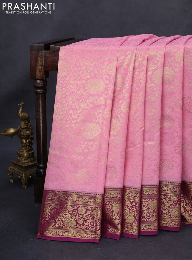 Kanchipuram silk saree light pink and wine shade with allover silver zari woven floral brocade weaves and long rich zari woven border