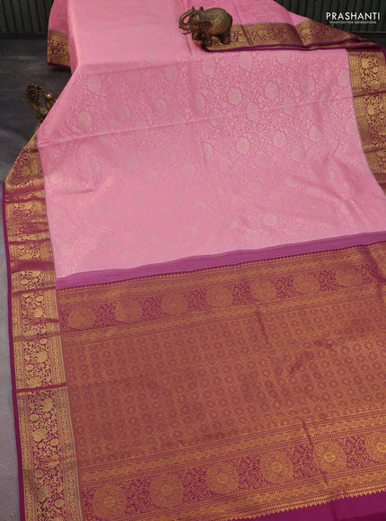 Kanchipuram silk saree light pink and wine shade with allover silver zari woven floral brocade weaves and long rich zari woven border
