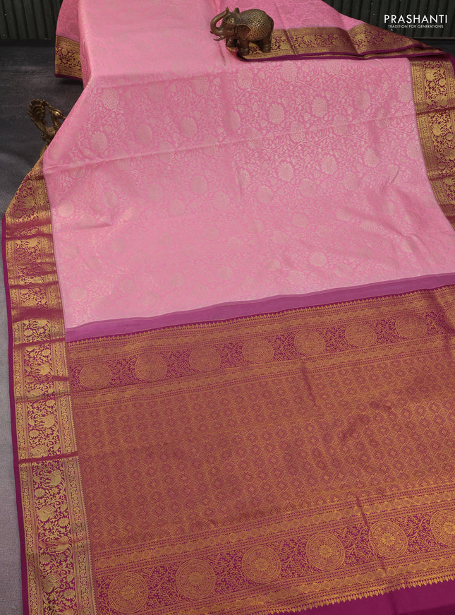 Kanchipuram silk saree light pink and wine shade with allover silver zari woven floral brocade weaves and long rich zari woven border