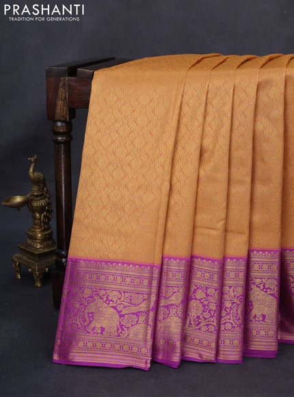 Kanchipuram silk saree peach orange and purple with allover zari woven brocade weaves and rich zari woven border