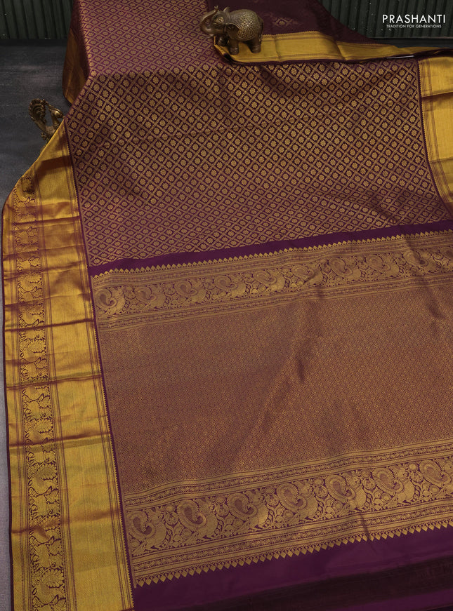 Kanchipuram silk saree wine shade with allover zari woven brocade weaves and long rich zari woven border