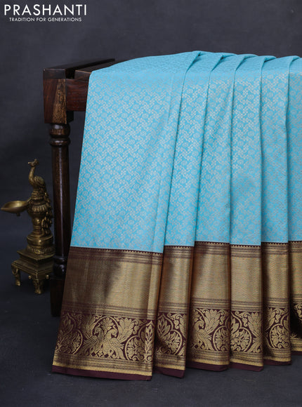 Kanchipuram silk saree light blue and coffee brown with allover silver zari woven brocade weaves and long rich zari woven border