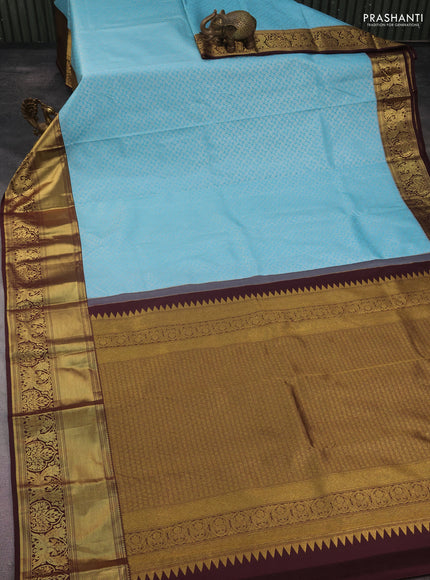 Kanchipuram silk saree light blue and coffee brown with allover silver zari woven brocade weaves and long rich zari woven border