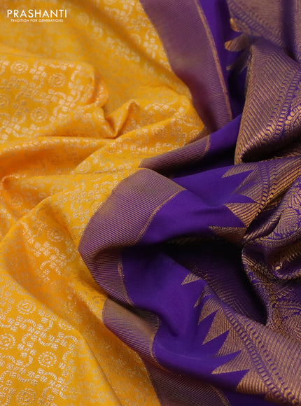 Kanchipuram silk saree yellow and violet with allover silver zari woven brocade weaves and long rich zari woven border
