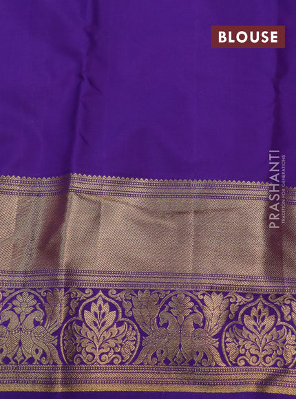 Kanchipuram silk saree yellow and violet with allover silver zari woven brocade weaves and long rich zari woven border