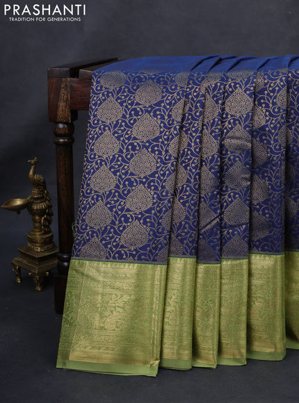 Kanchipuram silk saree dark blue and green with allover zari woven brocade weaves and long rich zari woven border