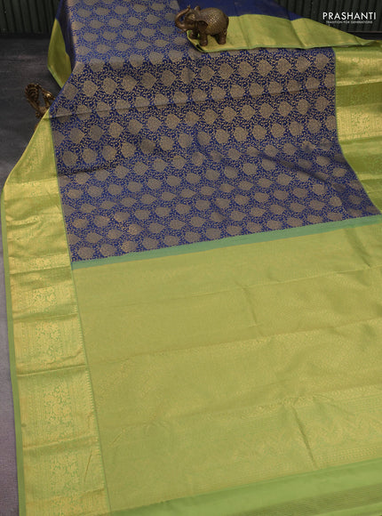 Kanchipuram silk saree dark blue and green with allover zari woven brocade weaves and long rich zari woven border