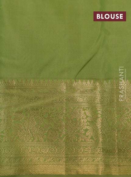Kanchipuram silk saree dark blue and green with allover zari woven brocade weaves and long rich zari woven border