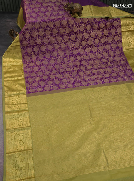 Kanchipuram silk saree purple and green shade with allover zari woven brocade weaves and long rich zari woven border