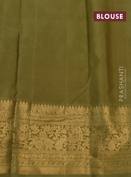 Kanchipuram silk saree purple and green shade with allover zari woven brocade weaves and long rich zari woven border