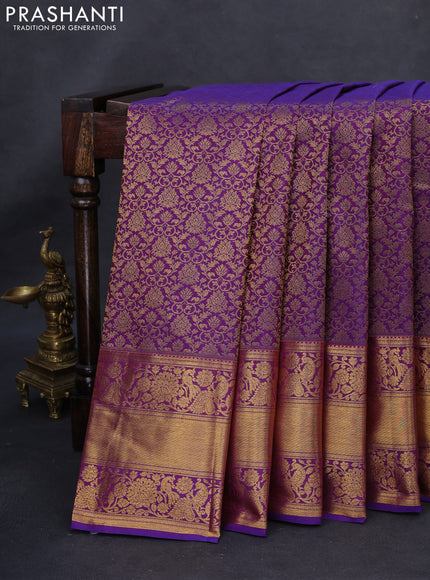 Kanchipuram silk saree dual shade of purple with allover zari woven brocade weaves and long rich zari woven border