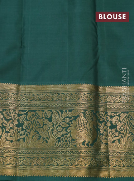 Kanchipuram silk saree red and green shade with allover zari woven brocade weaves and long rich zari woven border