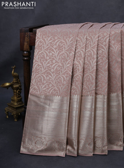 Kanchipuram silk saree pastel brown with allover silver zari woven brocade weaves and long rich silver zari woven border