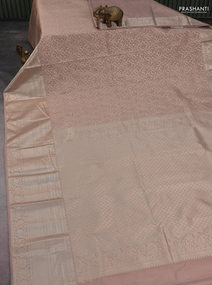 Kanchipuram silk saree pastel brown with allover silver zari woven brocade weaves and long rich silver zari woven border