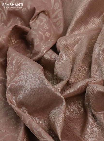 Kanchipuram silk saree pastel brown with allover silver zari woven brocade weaves and long rich silver zari woven border