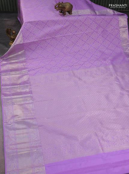 Kanchipuram silk saree lavender with allover silver zari woven brocade weaves and long rich silver zari woven border