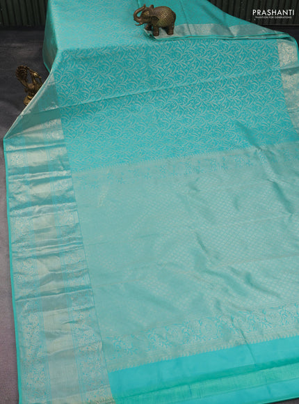 Kanchipuram silk saree teal green with allover silver zari woven brocade weaves and long rich silver zari woven border