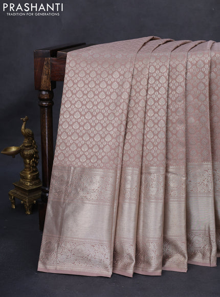Kanchipuram silk saree pastel pink with allover silver zari woven brocade weaves and long rich silver zari woven border