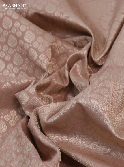 Kanchipuram silk saree pastel pink with allover silver zari woven brocade weaves and long rich silver zari woven border