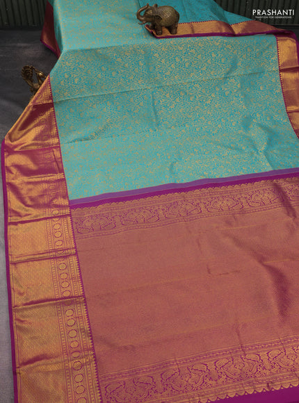 Kanchipuram silk saree teal blue and purple with allover zari woven brocade weaves and long rich zari woven border