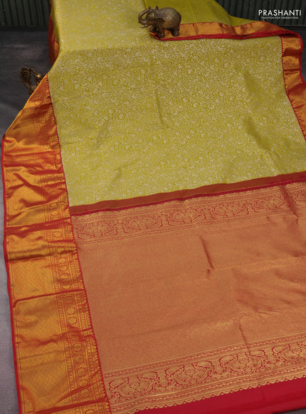 Kanchipuram silk saree mustard green and red with allover silver zari woven brocade weaves and long rich zari woven border