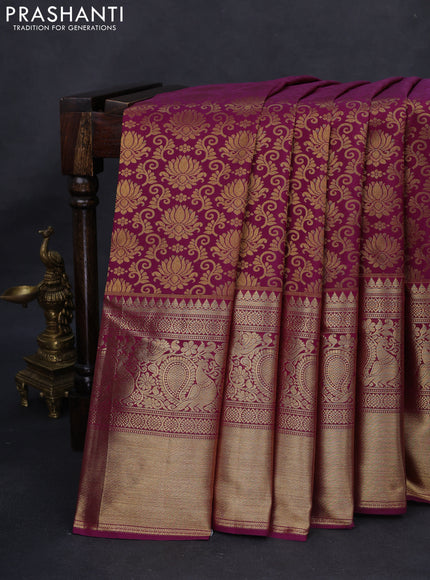Kanchipuram silk saree dark magenta pink with allover zari woven brocade weaves and long rich zari woven border