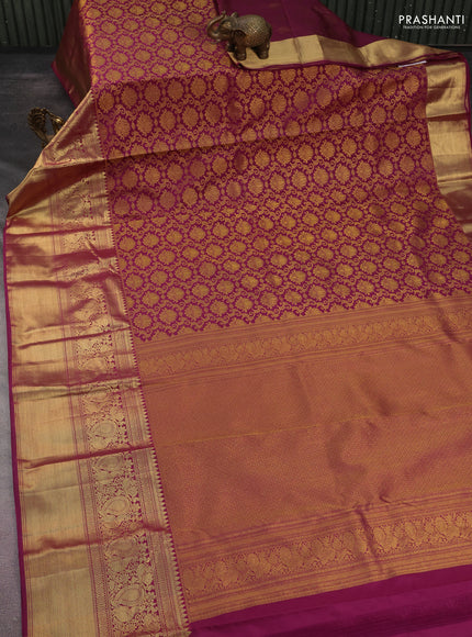 Kanchipuram silk saree dark magenta pink with allover zari woven brocade weaves and long rich zari woven border