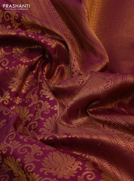 Kanchipuram silk saree dark magenta pink with allover zari woven brocade weaves and long rich zari woven border
