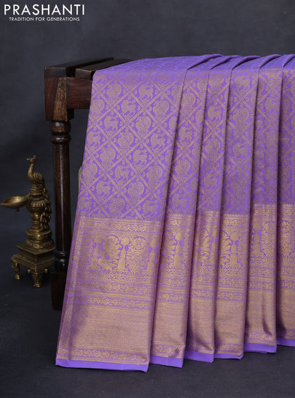 Kanchipuram silk saree lavender with allover zari woven brocade weaves and long rich zari woven border